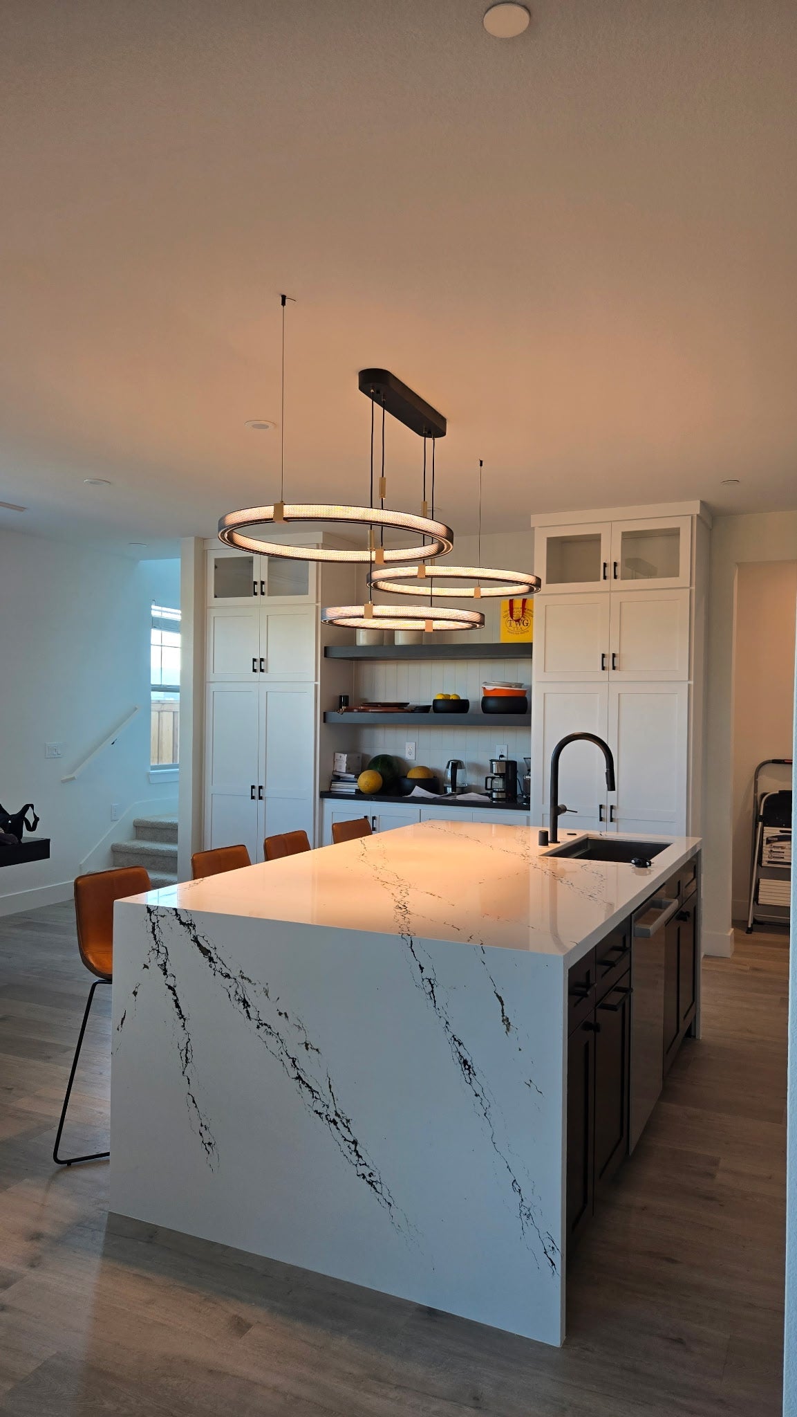 Matrix Rings chandelier hung in a customer's room